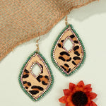 Faux Animal Hide Earrings with Tear Drop Cut Out and Beaded Accent - Lil Monkey Boutique