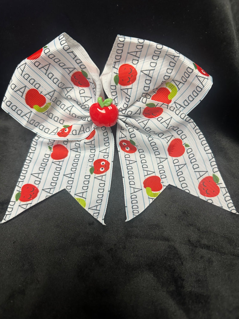 APPLE CENTER MULTI COLOR APPLE Aaaa PRINT BOW WITH TAILS ROUGHLY 6”