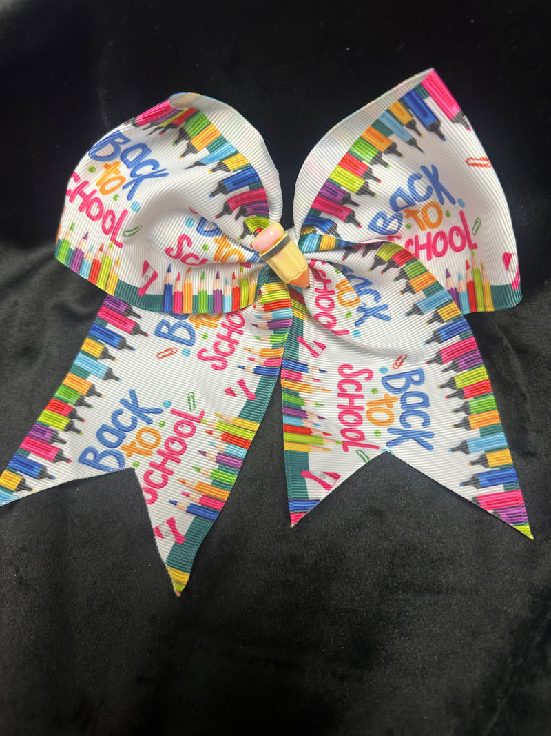 PENCIL CENTER MULTI COLOR BACK TO SCHOOL PRINT BOW WITH TAILS ROUGHLY 6”