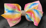 RHINESTONE CENTER BOW WITH MULTI COLOR BOW IN FRONT OF SOLID COLOR BOW (APPROX 4”) - Lil Monkey Boutique