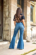 MID WASH EXTREME FLARE JEANS - Lil Monkey Boutique