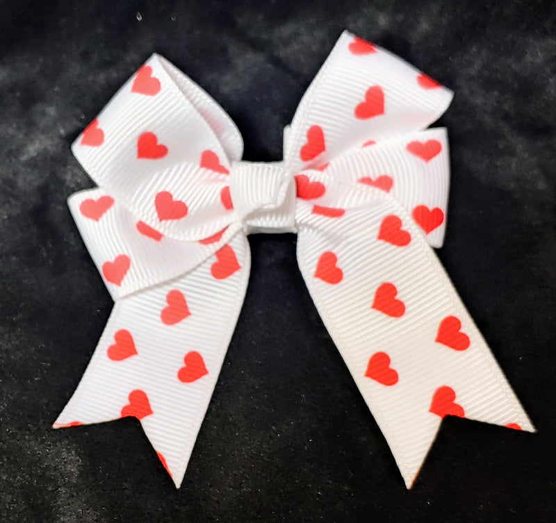 SMALL HEART PRINT BOW WITH TAILS (ROUGHLY 3"X3") - Lil Monkey Boutique