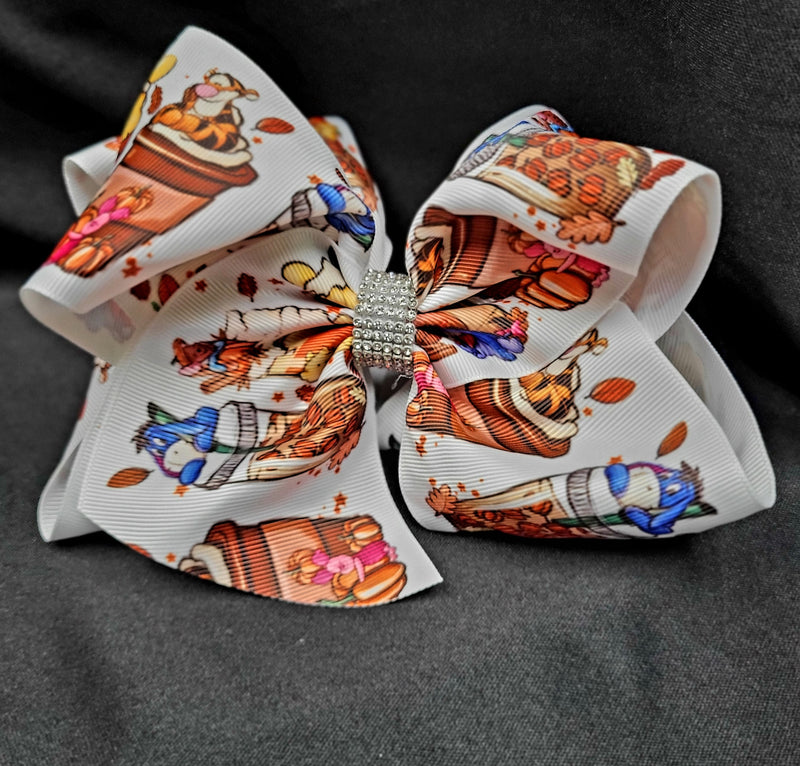 WINNIE THE POOH HONEY PRINT DOUBLE LAYER BOW WITH RHINESTONE CENTER (roughly 8”) - Lil Monkey Boutique