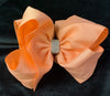 JUMBO SOLID BOWS WITH BLING CENTER (ROUGHLY 8”) - Lil Monkey Boutique