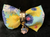 FLORAL CLOTH BOW WITH ACCENTS (roughly 3in) - Lil Monkey Boutique