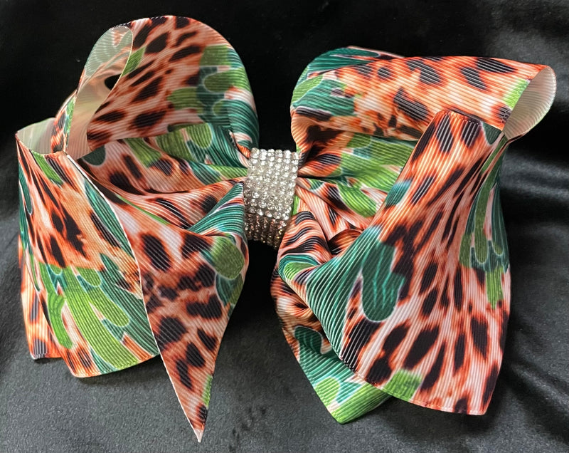 CACTUS CHEETAH PRINT BOWS WITH RHINESTONE CENTER  (roughly 8”) - Lil Monkey Boutique