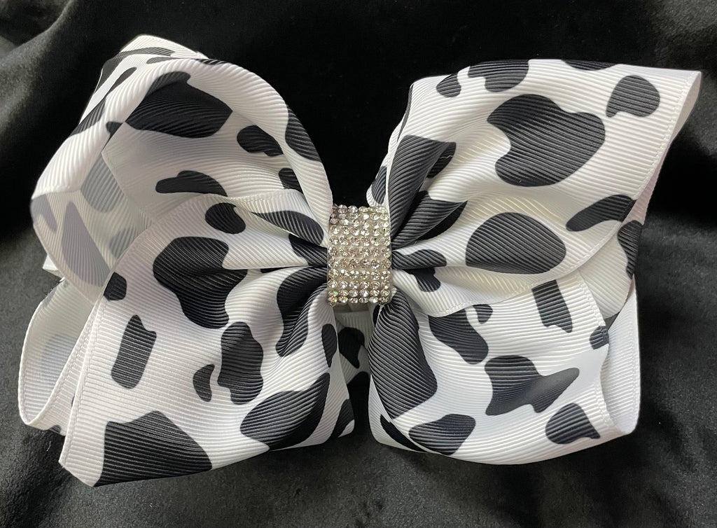 COW PRINT BOWS WITH RHINESTONE CENTER  (roughly 8”) - Lil Monkey Boutique